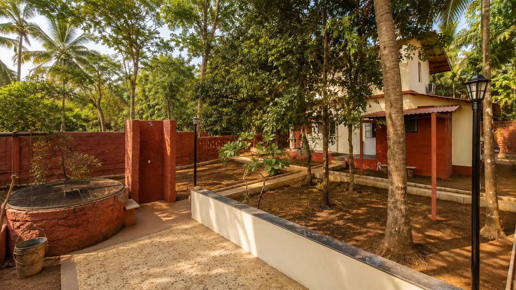 Backyard deck with traditional well and open-to-sky shower